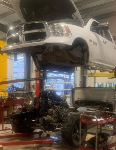 white truck on hoist